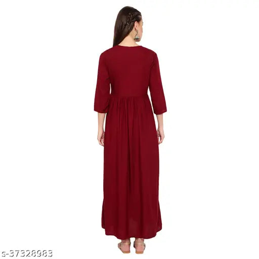 Red, embroidered women's dress with long sleeves