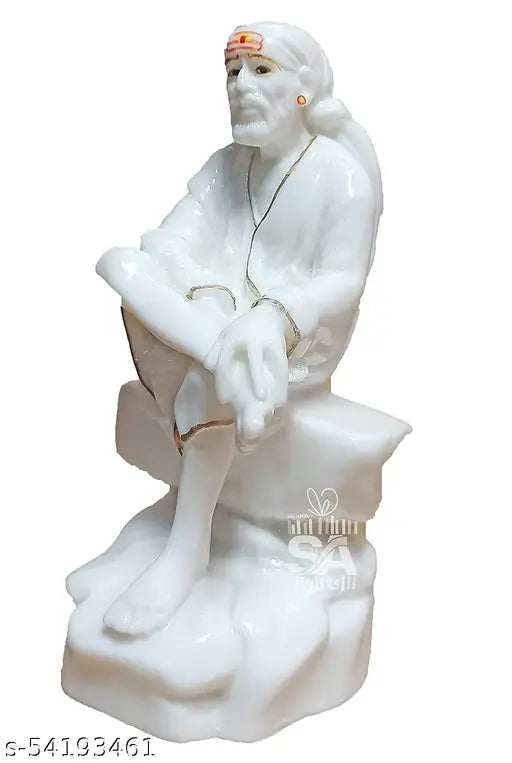 White marble figure of Sai Baba with Om Sai Ram embroidered on a velvet dress, sitting on a lotus base, dressed in traditional attire, for worship or religious decoration