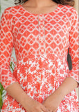 Orange rayon printed combo kurtis with embroidered yoke and tassels, three-quarter sleeves, vibrant Indian garment