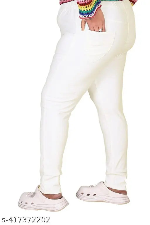 Plus-size premium white denim jeggings with Lycra stretch, elastic waistband, and 40" length in various sizes (40-54"). Indian-made quality jeans for a comfortable fit