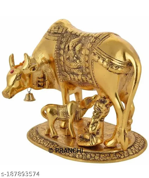 Golden Kamdhenu cow and calf with Little Krishna, Indian metal sculpture, 15.5cm x 12cm x 15cm, ideal for spiritual decor, gifting occasions