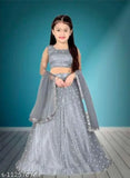 Polka print net lehenga choli set for girls, traditional Indian ethnic wear with embroidered patterns, 8-14 years sizes available