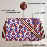 Red floral patterned cotton fabric handbag with adjustable straps