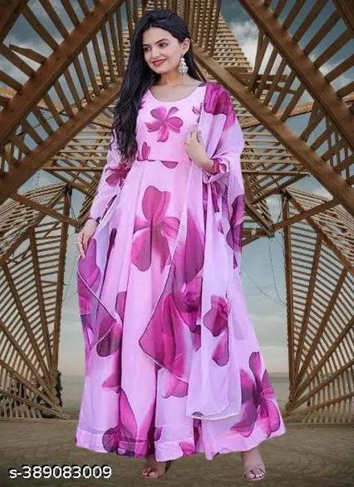 Pretty floral pink Georgette gown for women, long sleeves, printed net, ideal for weddings or parties. Handcrafted in India." (125 characters)