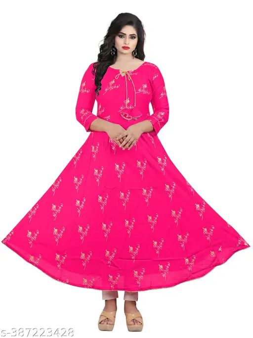 Pink rayon Anarkali kurta with three-quarter sleeves and printed combo, vibrant on model