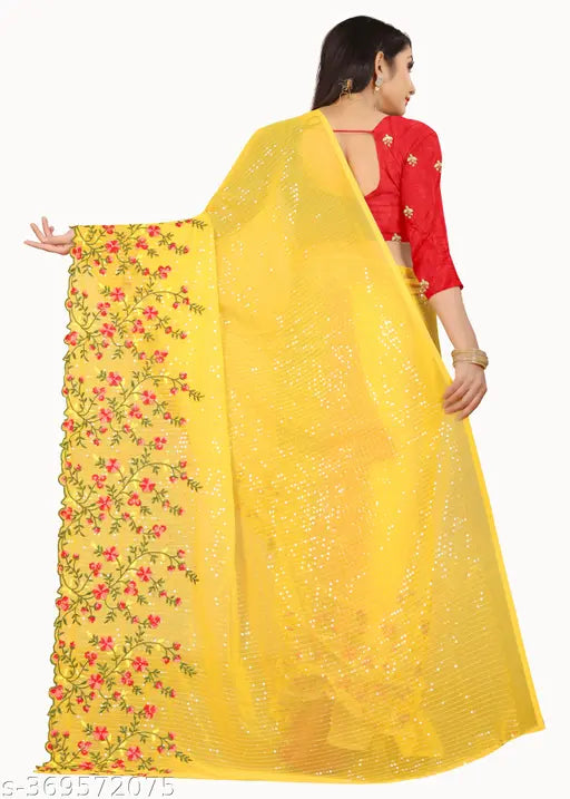 Yellow georgette saree with pink embroidery, red blouse