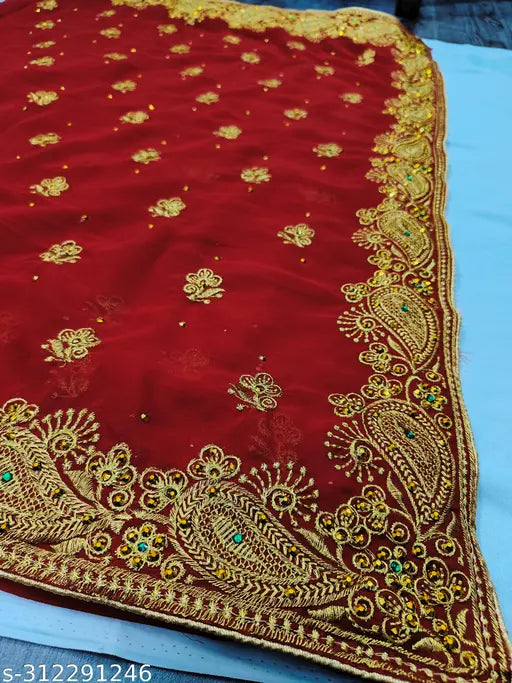 Red and gold traditional saree with intricate embroidery