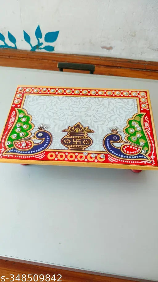 A marble ganesha idol, handcrafted in meenakari art style