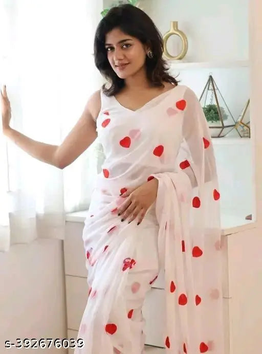Woman wearing a white blouse with red hearts