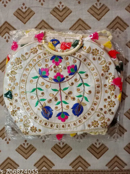 Multi-colored floral embroidered handbag, possibly leather or fabric