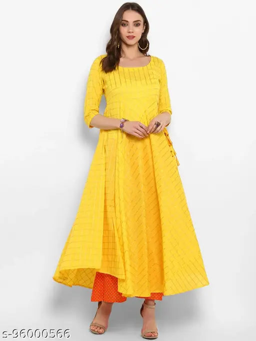 Long yellow cotton embroidered anarkali kurta with fitted silhouette and sleeves, traditional outfit suitable for casual or festive wear