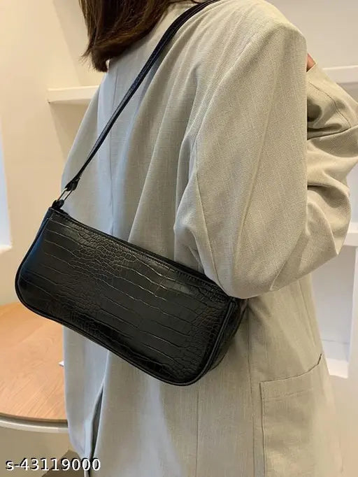 Black leather crocodile embossed sling bag