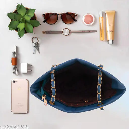 Ladies blue clutch purse with multiple card slots and a shoulder strap