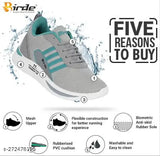 Gray and blue sports shoe with white accents, lace-up front, black rubber sole with small studs, designed for walking and comfort, suitable for kids