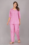 Pink cotton printed night suit set by Pragya Textile, featuring loose-fitting pyjamas with 3/4 sleeves and a charming floral print. Made from breathable cotton fabric for ultimate comfort during sleep or lounging