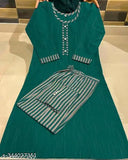 Turquoise and white paisley patterned dupatta with matching kurta set, ethnic wear for women's celebration