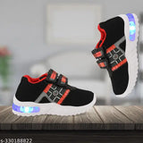 Black light-up casual sneakers with red velcro straps, suitable for outdoor sports or little kids