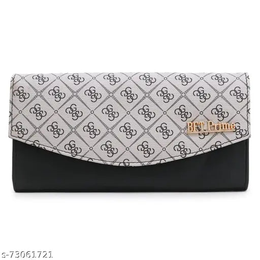 Cloth clutch with design, likely made of cotton or a similar fabric, in black with metallic accents