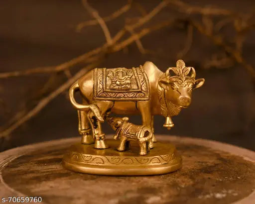 Handmade brass Kamdhenu Nandi cow statue with golden finish, symbolizing prosperity and Vatsalya (motherly love)