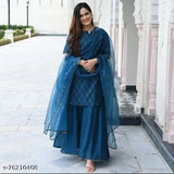 A blue Rayon saree with draped dupatta and skirt, paired with a matching blouse
