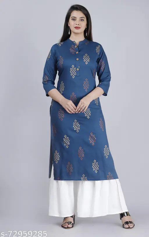 A woman in a printed mauka kurta and sharara, with a solid blue base