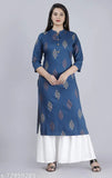 A woman in a printed mauka kurta and sharara, with a solid blue base