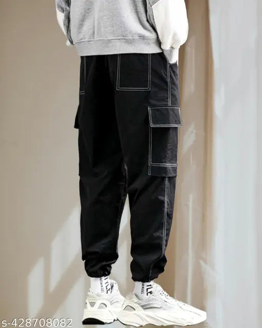 High-quality black lycra cargos for men. Lightweight, soft fabric trackpants with self design pattern. Add to your wardrobe today. Made in India. (Black men's Lycra cargos for sporty look)