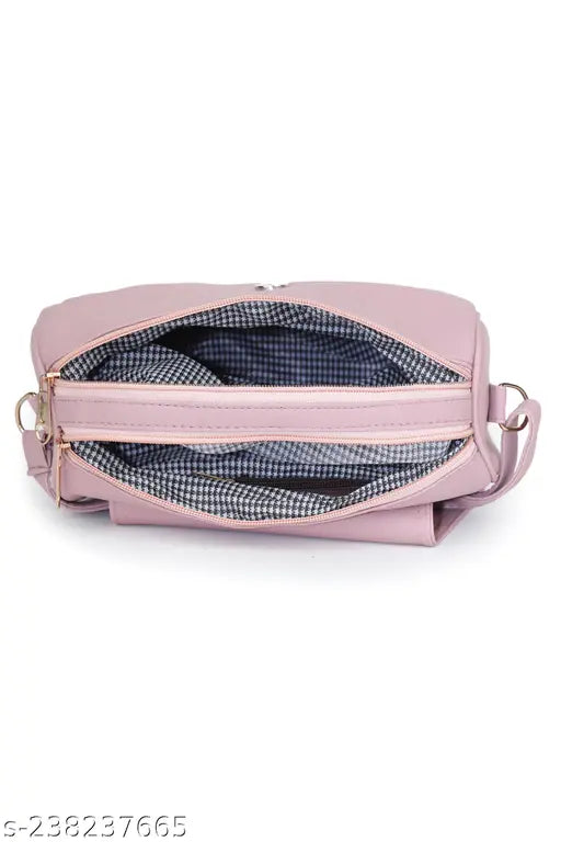 Pink mesh sling bag with zip closure