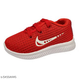 Red athletic shoe with white sole and black laces, suitable for kids' sports activities
