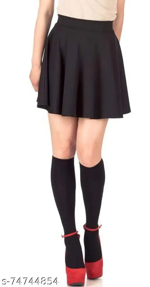 Black polyester women's solid short skirt (TS-5003-Black), various sizes available including 26, 28, 30, 32, 34, and 36. Indian-made fashion item on display