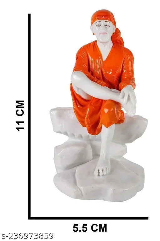 White poly resin Sai Baba idol for car dashboard or home decor (4.5" orange), handcrafted by skilled artisans, symbolizes spirituality and brings wealth, health, peace, and happiness in Vastu-compliant spaces. Great gifting option for special occasions. Made in India