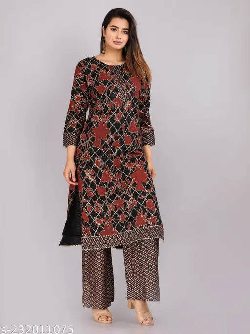 Black rayon kuti set with palazzos, printed and featuring three-quarter sleeves. Set includes sizes S to XXL, originating from India