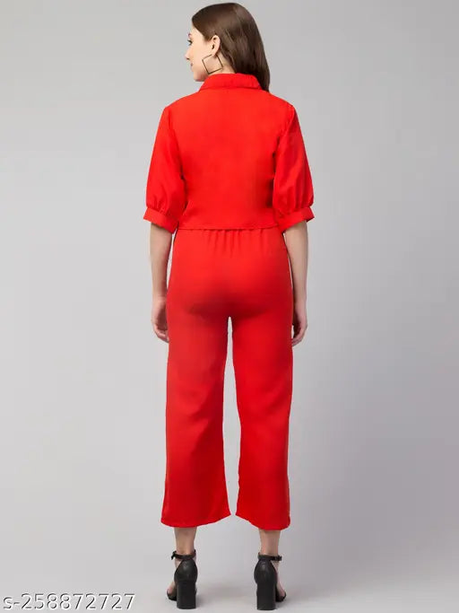 Stylish crepe sleeveless jumpsuit with shrug for women, solid color on fashion mannequin