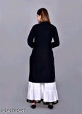 Black kameez, long sleeves, knee-length skirt with high waist