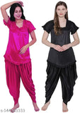 Pink Hub women's solid black satin night suit set in pink, featuring short sleeves and patiala pants with lace detailing and elastic waistband