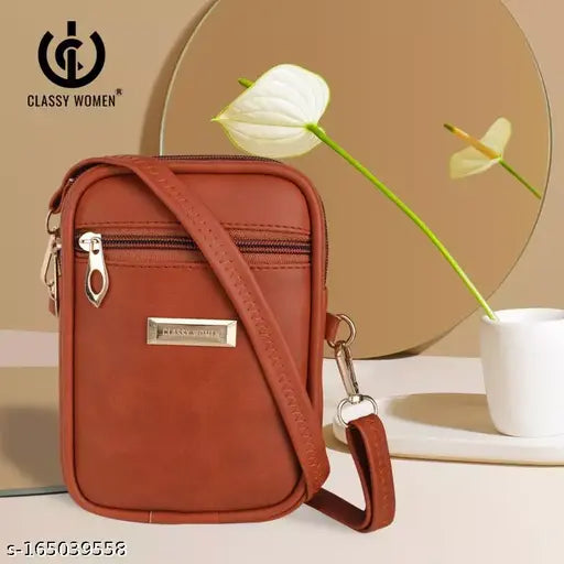 A small crossbody phone bag in brown PU leather
