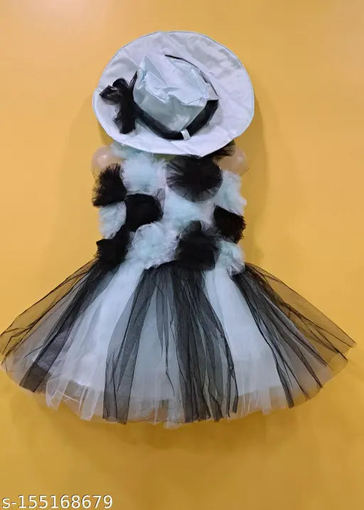 Green net dress with black and white trim, baby size