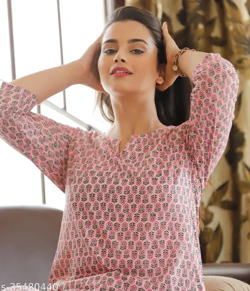 Cotton printed pink night suit, stylish and comfortable for women and girls with three-quarter sleeves. Luxurious and cozy pajama set for sleepwear or loungewear. Made of pure cotton, origin India