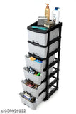 Gray plastic drawer organizer system with multiple compartments and a designated space for toys, books, clothes, and shoes