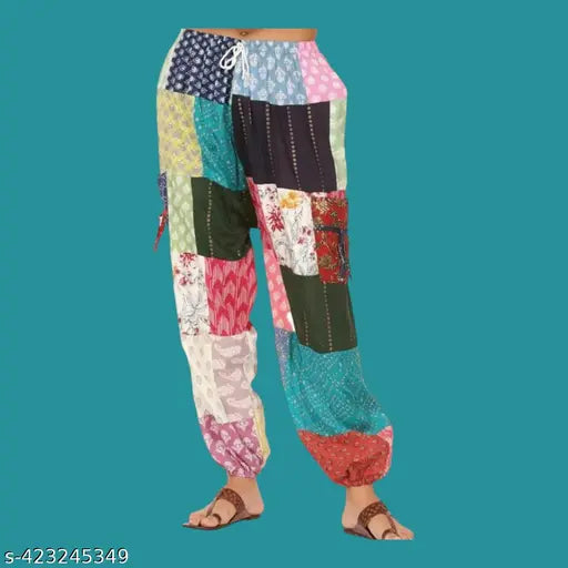 Colorful, long harem pants with a mix of colors and patterns