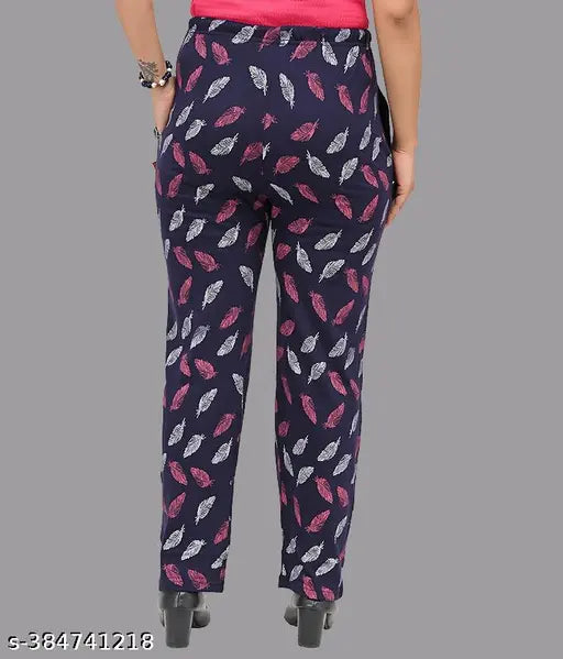 Women's regular fit track pants, navy blue with a white floral pattern