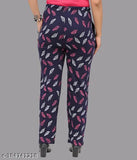 Women's regular fit track pants, navy blue with a white floral pattern