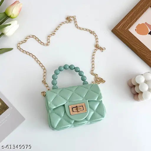 Green silicone mini purse with gold chain strap