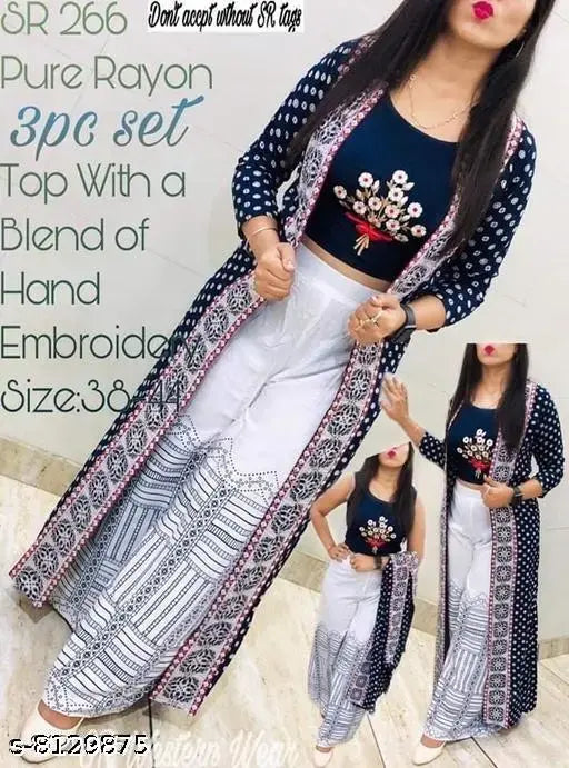 Embroidered rayon crop top kurti with palazzos, Indian women's fashion in net pattern on display