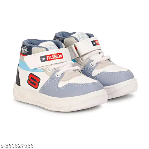 Stylish grey kids' Jordans with white sole and lace-up design, sports brand logo on side