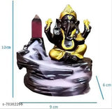 A Khushi handcrafted showpiece, combines a blue resin smoke backflow and a gold figurine, with a matching green resin smoke backflow cone; decorative, gifting, home accents