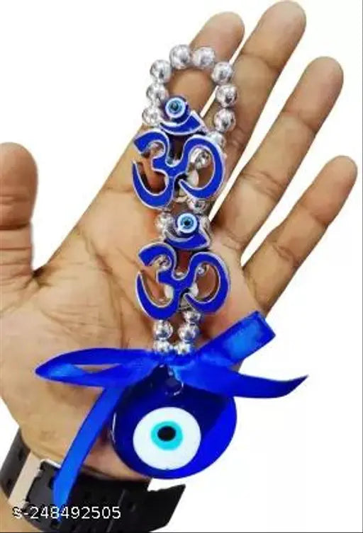 Turkish evil eye charm, double om good luck pendant, hanging in glass