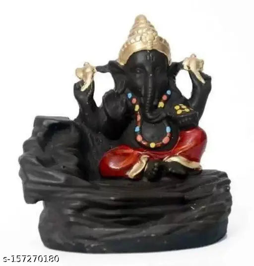 Ganesha figurine with blue base and red adornments