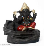 Ganesha figurine with blue base and red adornments