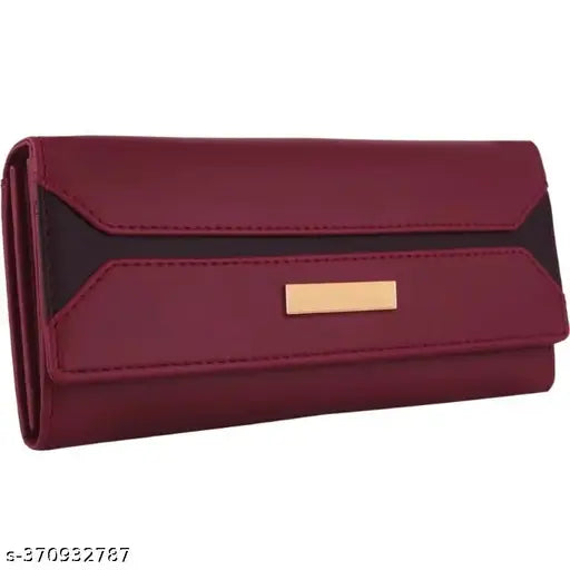 Maroon leather clutch with zip closure and multiple card slots